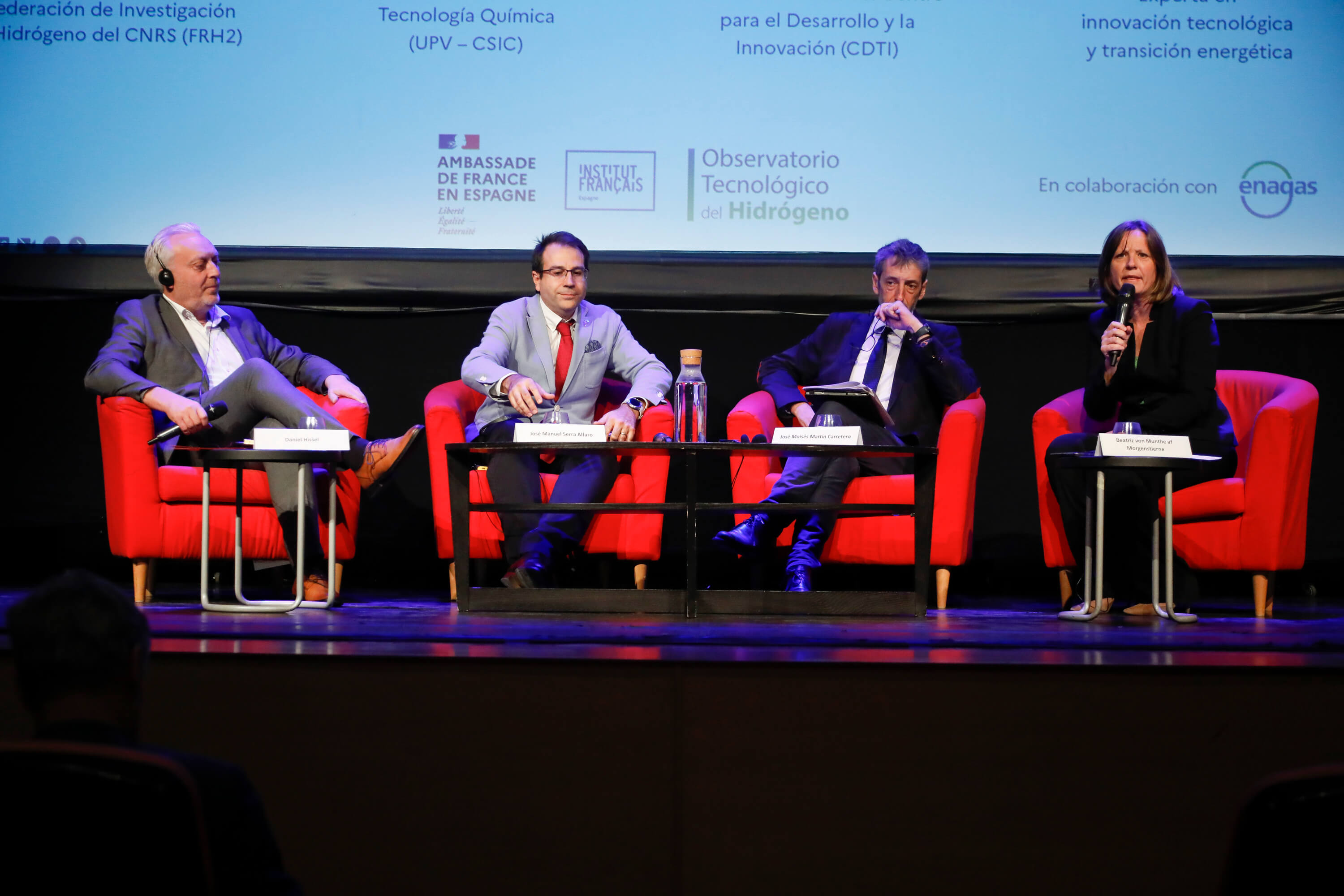 Speakers at a roundtable during the event